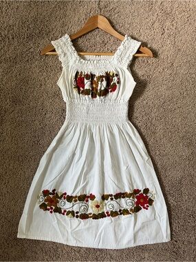 White Smocked Mini Dress with Floral Embroidery